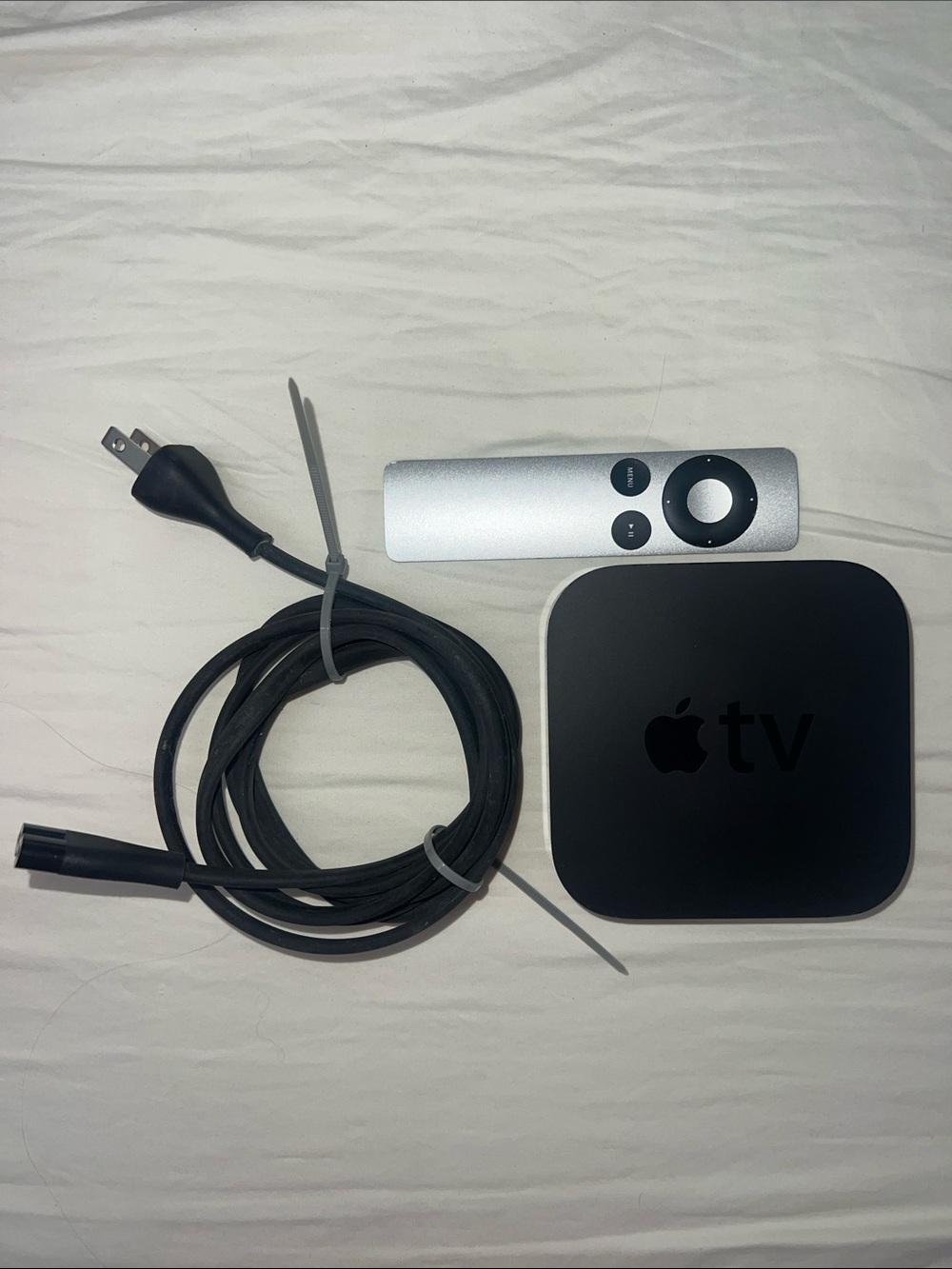 3rd Generation Apple TV factory reset with original silver remote and cable